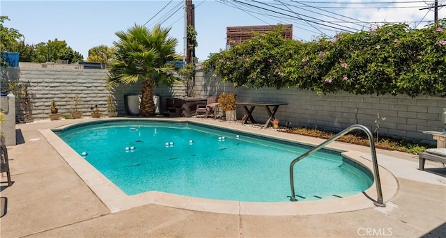 3935 Lime Ave, Long Beach, CA 90807 - view of swimming pool featuring a fenced backyard and a patio