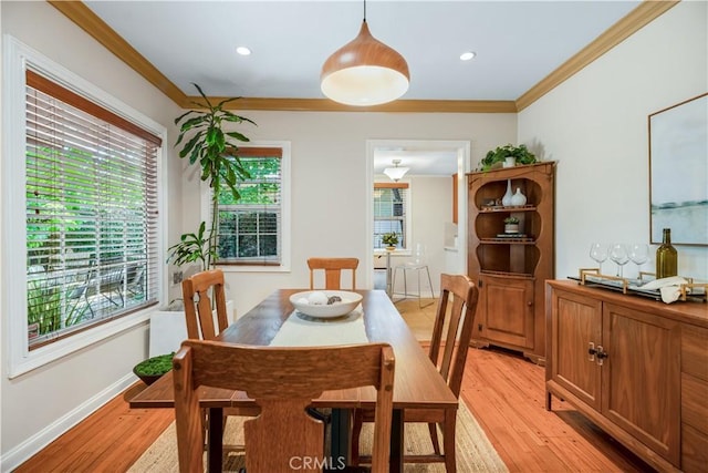 3935 Lime Ave, Long Beach, CA 90807 - dining area featuring healthy amount of natural light, light wood-style flooring, crown molding, and recessed lighting