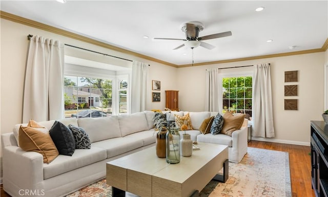 3935 Lime Ave, Long Beach, CA 90807 - living room featuring ceiling fan, ornamental molding, wood finished floors, and recessed lighting