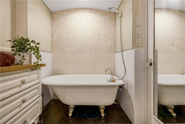 3935 Lime Ave, Long Beach, CA 90807 - full bathroom featuring tile walls, a soaking tub, vanity, tile patterned floors, and wainscoting