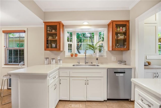 3935 Lime Ave, Long Beach, CA 90807 - kitchen featuring stainless steel dishwasher, light countertops, a peninsula, and crown molding