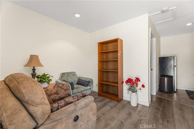 3935 Lime Ave, Long Beach, CA 90807 - sitting room featuring attic access, wood finished floors, and recessed lighting