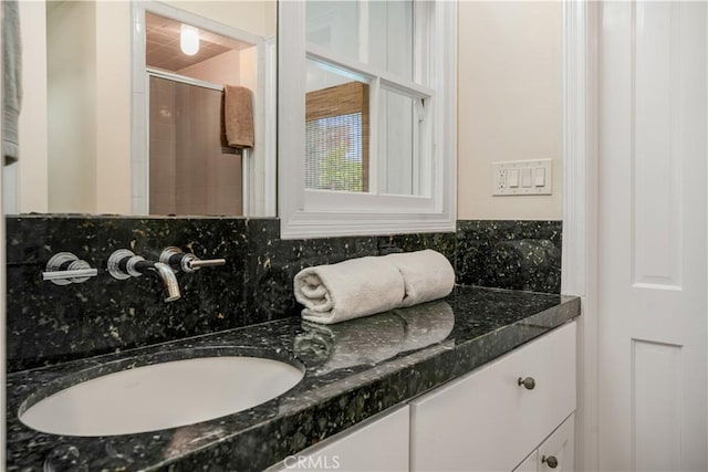3935 Lime Ave, Long Beach, CA 90807 - bathroom with vanity, tiled shower, and tasteful backsplash