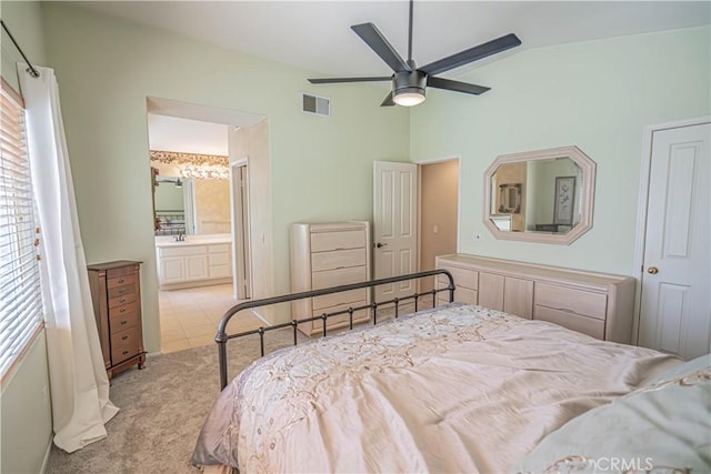 25868 Hammet Cir, Stevenson Ranch, CA 91381 - bedroom featuring lofted ceiling, multiple windows, carpet flooring, connected bathroom, and ceiling fan