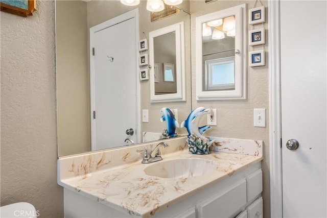 18043 Preston St, Hesperia, CA 92345 - bathroom with a textured wall and vanity
