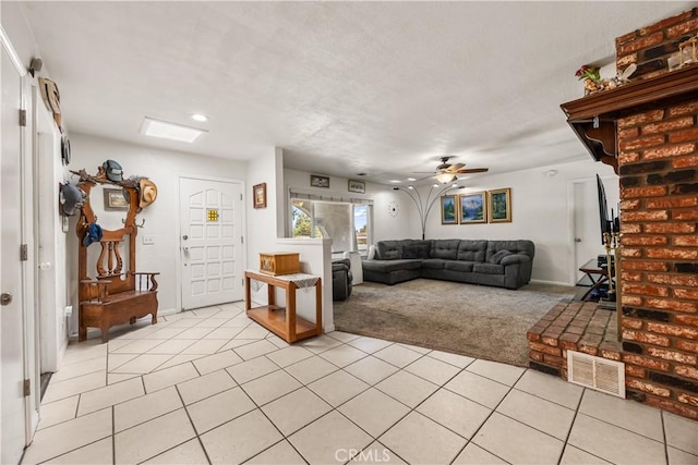 18043 Preston St, Hesperia, CA 92345 - living room featuring light colored carpet, light tile patterned floors, ceiling fan, and recessed lighting