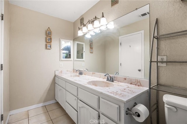 18043 Preston St, Hesperia, CA 92345 - bathroom featuring double vanity and tile patterned floors