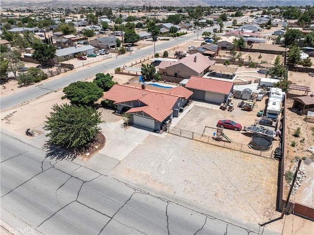 18043 Preston St, Hesperia, CA 92345 - aerial perspective of suburban area with a mountainous background