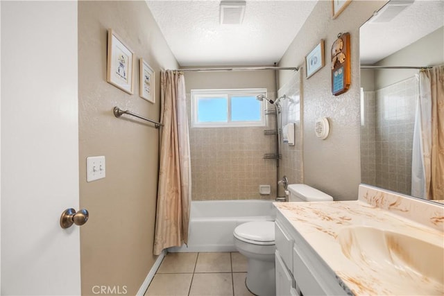 18043 Preston St, Hesperia, CA 92345 - full bathroom with vanity, tile patterned floors, shower / bath combo with shower curtain, and a textured ceiling