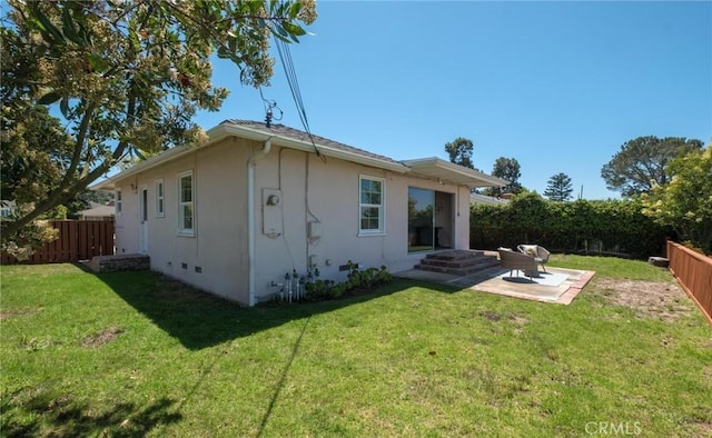 5527 Elmbank Rd, Rancho Palos Verdes, CA 90275 - rear view of house with a fenced backyard, stucco siding, and a patio area