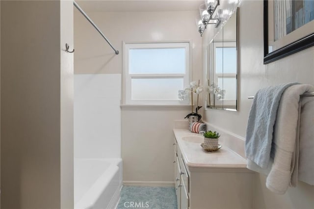 5527 Elmbank Rd, Rancho Palos Verdes, CA 90275 - bathroom with vanity, washtub / shower combination, and a chandelier