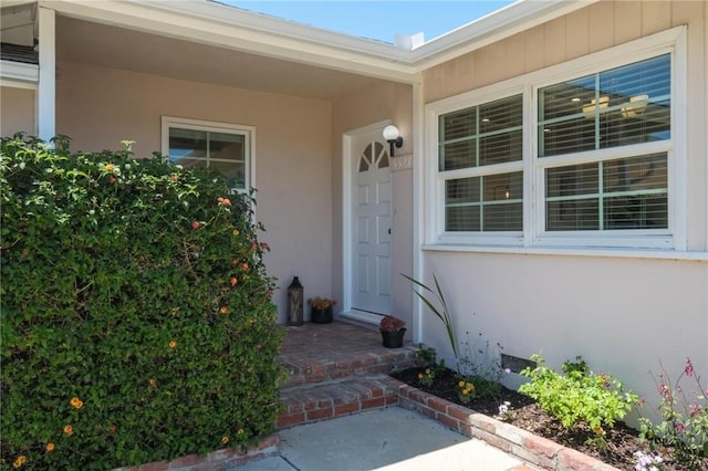 5527 Elmbank Rd, Rancho Palos Verdes, CA 90275 - view of exterior entry with stucco siding and covered porch