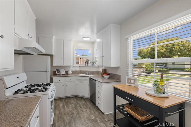 5527 Elmbank Rd, Rancho Palos Verdes, CA 90275 - kitchen with white appliances, under cabinet range hood, white cabinetry, and light wood-type flooring