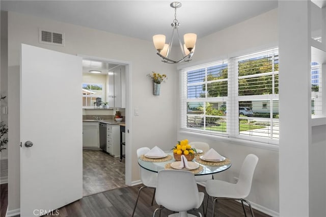5527 Elmbank Rd, Rancho Palos Verdes, CA 90275 - dining room featuring a chandelier and dark wood finished floors