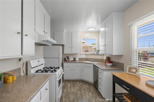 5527 Elmbank Rd, Rancho Palos Verdes, CA 90275 - kitchen with white appliances, under cabinet range hood, white cabinets, light wood-style floors, and light countertops