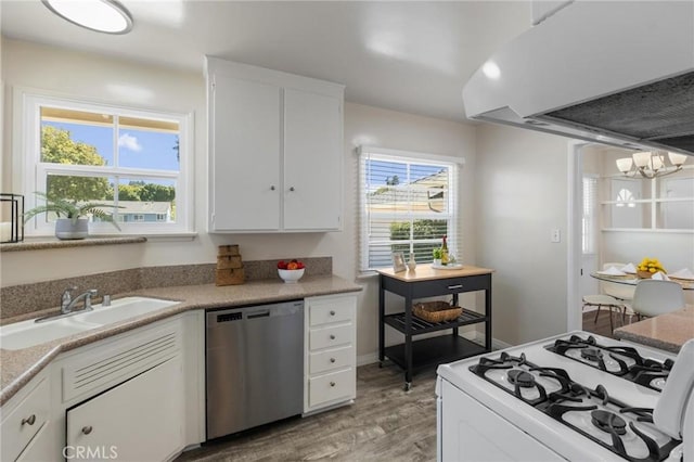 5527 Elmbank Rd, Rancho Palos Verdes, CA 90275 - kitchen featuring stainless steel dishwasher, gas range gas stove, light wood-style floors, a chandelier, and exhaust hood