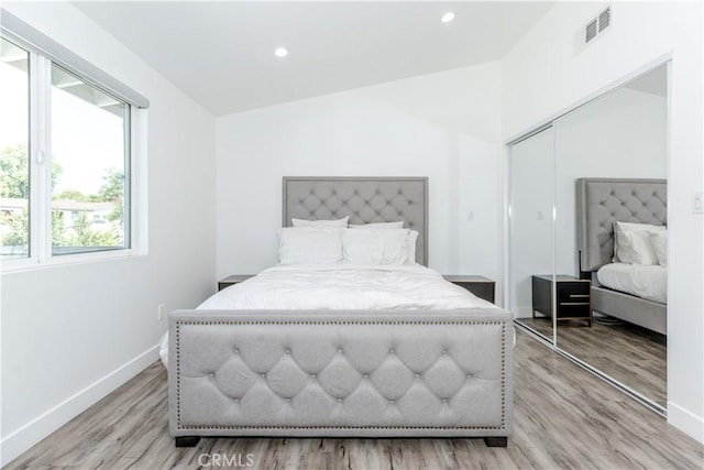 16652 Itasca St, Northridge, CA 91343 - bedroom featuring light wood finished floors, lofted ceiling, recessed lighting, and a closet