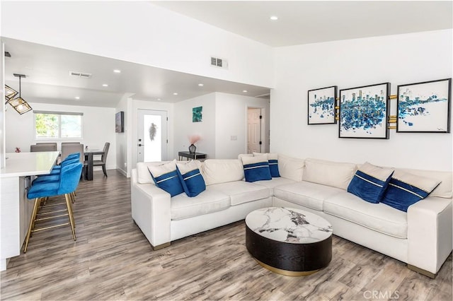 16652 Itasca St, Northridge, CA 91343 - living room with light wood finished floors and recessed lighting