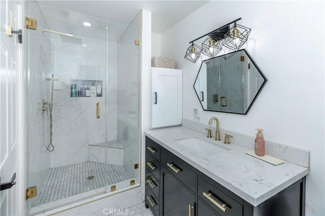 16652 Itasca St, Northridge, CA 91343 - bathroom with a marble finish shower, vanity, and recessed lighting