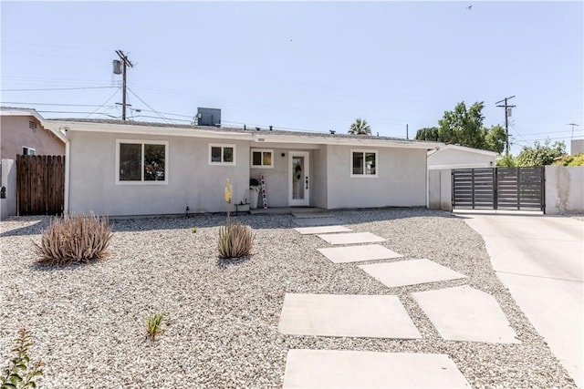 16652 Itasca St, Northridge, CA 91343 - ranch-style home with stucco siding and a gate