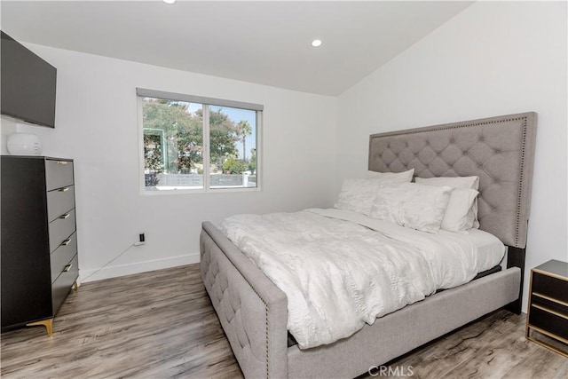 16652 Itasca St, Northridge, CA 91343 - bedroom featuring wood finished floors, vaulted ceiling, and recessed lighting