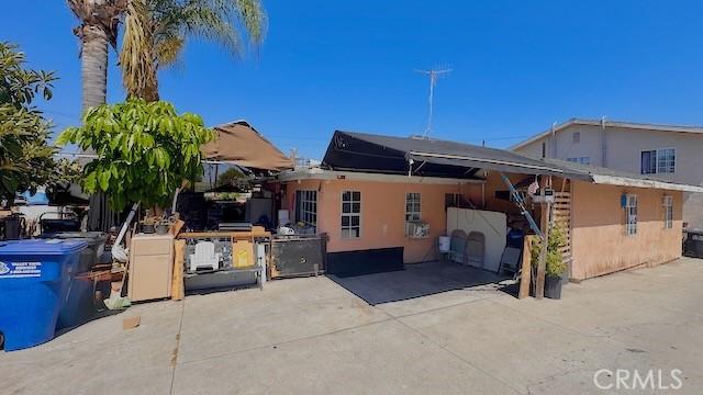 3844 Whiteside St, East Los Angeles, CA 90063 - view of property exterior with a patio and stucco siding
