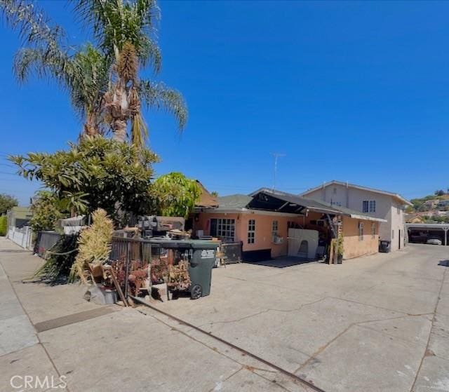 3844 Whiteside St, East Los Angeles, CA 90063 - view of front of home with stucco siding and a patio