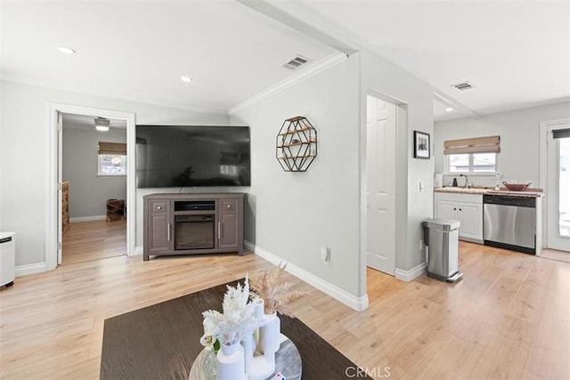 1151 El Camino Real, Simi Valley, CA 93063 - unfurnished living room with ornamental molding, light wood-type flooring, and recessed lighting