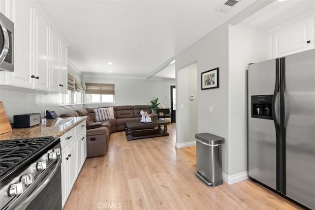 1151 El Camino Real, Simi Valley, CA 93063 - kitchen with appliances with stainless steel finishes, white cabinetry, light wood-type flooring, open floor plan, and light stone countertops