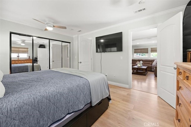 1151 El Camino Real, Simi Valley, CA 93063 - bedroom featuring crown molding, light wood-style flooring, a ceiling fan, and a closet