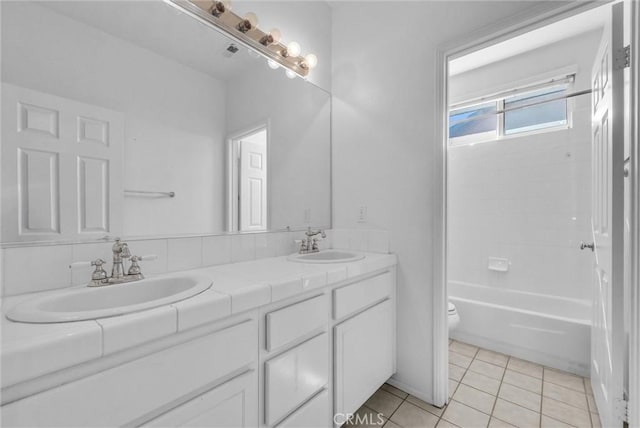 16461 Medinah St, Fontana, CA 92336 - bathroom featuring double vanity, tile patterned floors, and shower / bath combination