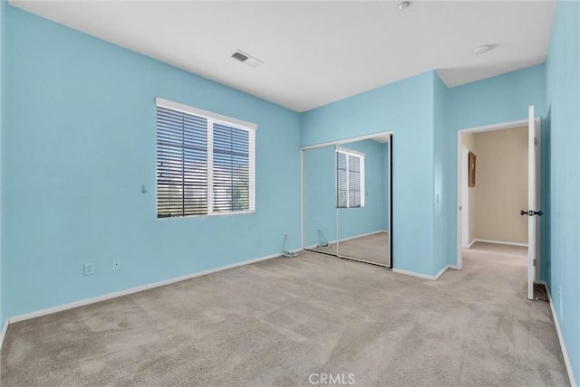 16461 Medinah St, Fontana, CA 92336 - unfurnished bedroom featuring carpet and a closet