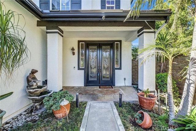 16461 Medinah St, Fontana, CA 92336 - doorway to property with french doors and stucco siding