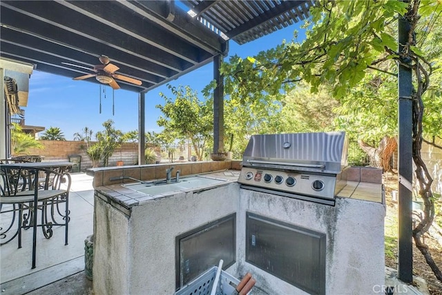 16461 Medinah St, Fontana, CA 92336 - fenced backyard featuring area for grilling, ceiling fan, a patio, a pergola, and outdoor dining space
