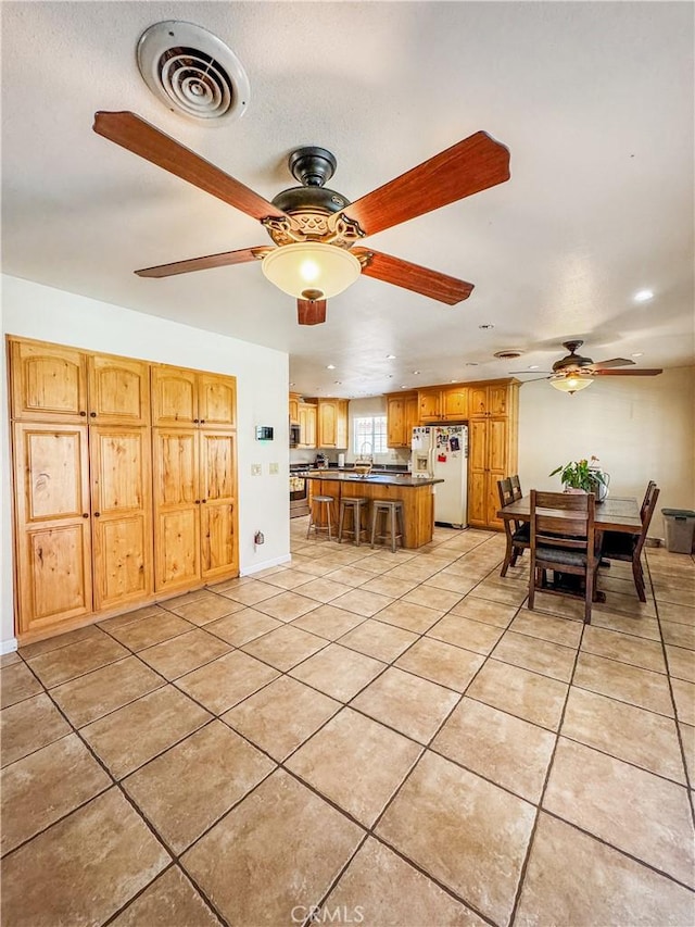 741 Ocotillo Rd, Blythe, CA 92225 - dining area with ceiling fan, light tile patterned floors, and recessed lighting