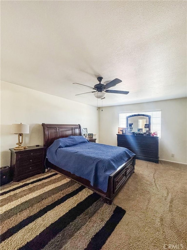 741 Ocotillo Rd, Blythe, CA 92225 - bedroom featuring carpet, ceiling fan, and a textured ceiling