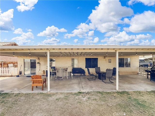 204 Shaded Palm, Blythe, CA 92225 - back of house featuring stucco siding and a patio