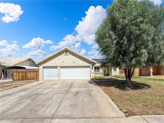 204 Shaded Palm, Blythe, CA 92225 - ranch-style house featuring driveway, stucco siding, roof mounted solar panels, and an attached garage