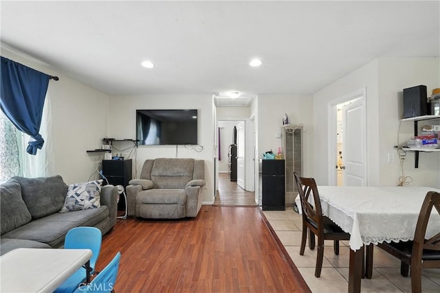 711 E 118th St, Los Angeles, CA 90059 - living room featuring light wood finished floors, recessed lighting, and attic access