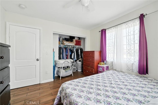711 E 118th St, Los Angeles, CA 90059 - bedroom with wood finished floors, a closet, and ceiling fan
