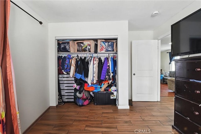 711 E 118th St, Los Angeles, CA 90059 - bedroom with wood finished floors and a closet
