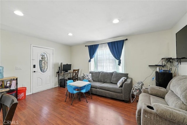 711 E 118th St, Los Angeles, CA 90059 - living room featuring wood finished floors, recessed lighting, and a desk