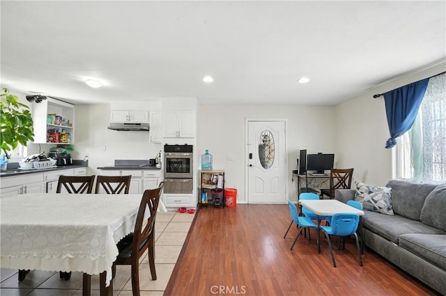 711 E 118th St, Los Angeles, CA 90059 - living room with wood finished floors and recessed lighting