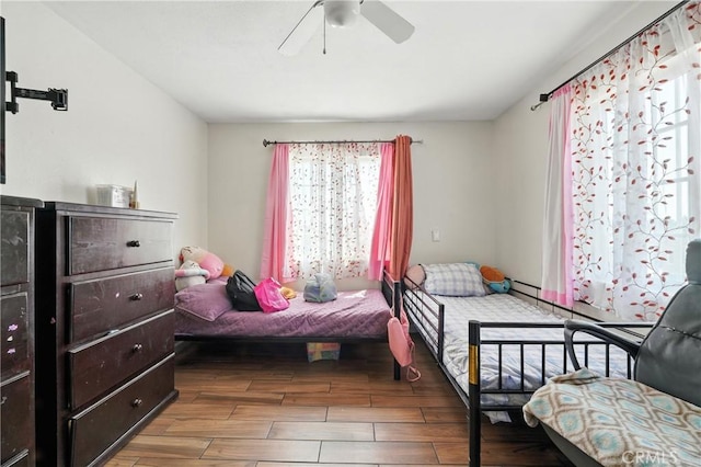 711 E 118th St, Los Angeles, CA 90059 - bedroom with wood finished floors and ceiling fan