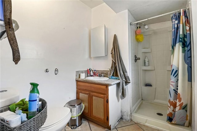 2734 S Redondo Blvd, Los Angeles, CA 90016 - bathroom featuring vanity, tile patterned flooring, and tiled shower