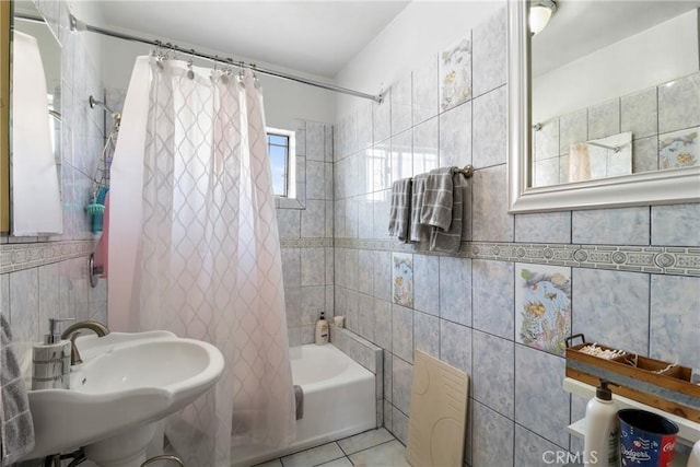 2734 S Redondo Blvd, Los Angeles, CA 90016 - full bathroom with tile walls, shower / tub combo, and tile patterned floors