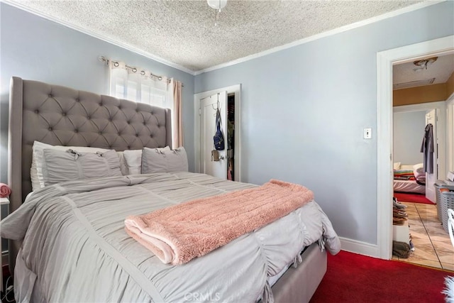2734 S Redondo Blvd, Los Angeles, CA 90016 - bedroom featuring crown molding, a textured ceiling, and carpet