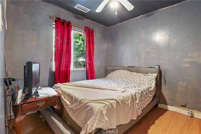 2734 S Redondo Blvd, Los Angeles, CA 90016 - bedroom featuring wood finished floors and a ceiling fan
