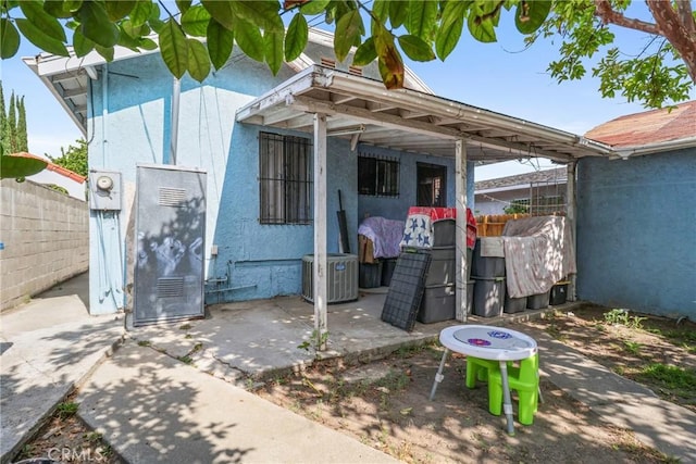2734 S Redondo Blvd, Los Angeles, CA 90016 - view of exterior entry featuring stucco siding and a patio