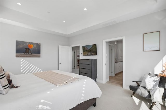 152 Plum Lily, Irvine, CA 92618 - bedroom with light colored carpet, recessed lighting, and ensuite bath